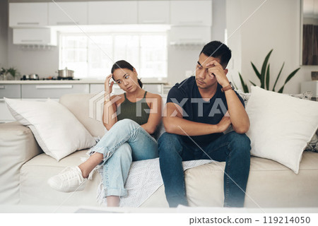 Stress, divorce or couple fight on sofa with anxiety, fear or frustrated by liar, fail or drama at home. Marriage, conflict or asian people argue in living room with blame, overthinking or mistake 119214050