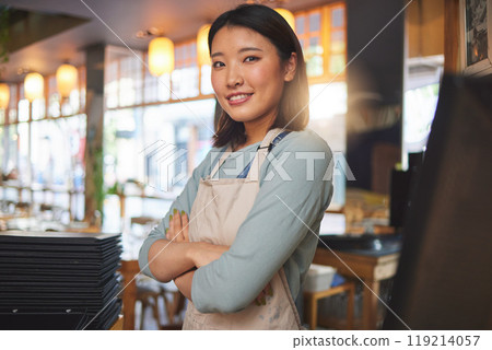 Waitress, portrait and Asian woman with arms crossed at cafe, coffee shop or store. Face, smile and confident barista, happy employee or small business entrepreneur at restaurant startup in Japan Waitress, portrait and Asian woman with arms crossed at cafe, coffee shop or store. Face, smile and confident barista, happy employee or small business entrepreneur at restaurant startup in Japan 119214057