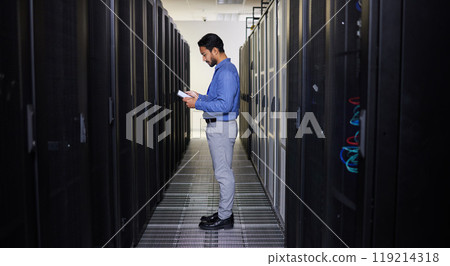 Tablet, man and technician in data center on research for programming at night. Information technology, inspection and engineer in server room reading, network maintenance or typing code for software 119214318