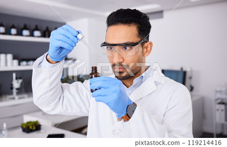 Scientist, man and bottle, pipette and chemical solution with medical research, investigation and goggles for safety. Chemistry, liquid and science in laboratory, future and biotechnology with study 119214416