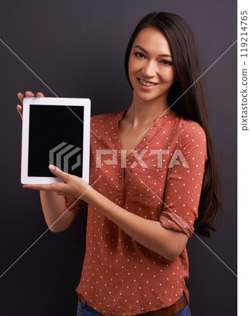Woman, studio and tablet with mockup, screen and technology for communication and connectivity. Model, tech and confidence with smile, happiness and space for online app or social media connection Woman, studio and tablet with mockup, screen and technology for communication and connectivity. Model, tech and confidence with smile, happiness and space for online app or social media connection 119214765
