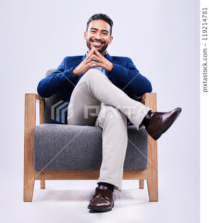 Portrait, confident and business man on chair in studio isolated on a white background. Professional lawyer, consultant and happy attorney, employee and Mexican worker in corporate suit at law firm Portrait, confident and business man on chair in studio isolated on a white background. Professional lawyer, consultant and happy attorney, employee and Mexican worker in corporate suit at law firm 119214781