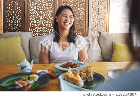 Sushi, restaurant and Japanese food with a woman smile with noodles and fish dish. Lunch, hungry Asian female person and Chinese meal with a friend happy from bonding and eating together at a table Sushi, restaurant and Japanese food with a woman smile with noodles and fish dish. Lunch, hungry Asian female person and Chinese meal with a friend happy from bonding and eating together at a table 119214804