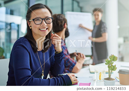 Portrait, business and happy Asian woman writing notes in office, meeting or coworking in creative startup workplace. Face, secretary and smile of entrepreneur with glasses or professional at table Portrait, business and happy Asian woman writing notes in office, meeting or coworking in creative startup workplace. Face, secretary and smile of entrepreneur with glasses or professional at table 119214833