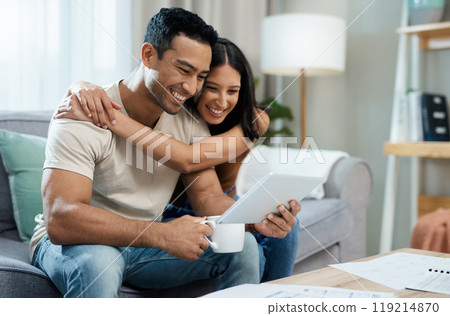Happy couple, hug and tablet for social media on sofa in house for funny joke, meme or post. Man, woman and smile in excitement with coffee for article on internet, mobile app and web for relaxing 119214870