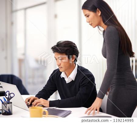 Mentor, help and teamwork on laptop in office with businessman learning from support of woman. Feedback, advice and manager training asian man on computer in collaboration and reading online research Mentor, help and teamwork on laptop in office with businessman learning from support of woman. Feedback, advice and manager training asian man on computer in collaboration and reading online research 119214995