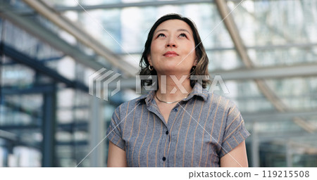 Thinking, vision and asian woman in office building with career, idea or planning for questions. Goal, dream and business female entrepreneur at work with positive attitude, growth or confidence 119215508