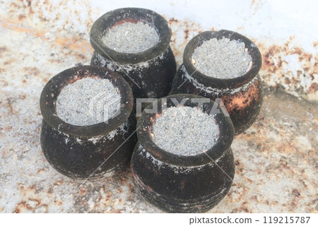 sand in clay pot on nursery 119215787