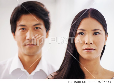 Portrait, woman and Asian man in office, serious and employees in corporate company with teamwork. Collaboration, girl and male person working together as colleagues for project of startup business 119215835