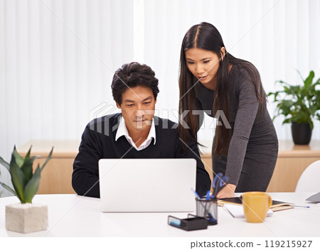 Japanese people, laptop and teamwork working in a office with desk and corporate staff. Advice, tech and internet research for company project at a startup with consulting firm with planning 119215927