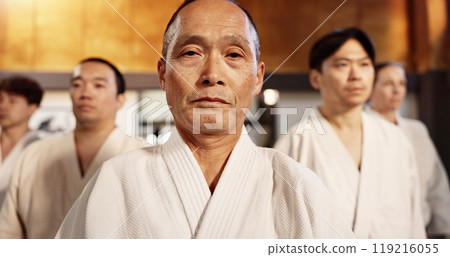 Aikido class, students or portrait for martial arts, sensei or ready for training, gym or group in dojo. Japanese people, sport or exercise in club, workout or fitness for fight, black belt or battle Aikido class, students or portrait for martial arts, sensei or ready for training, gym or group in dojo. Japanese people, sport or exercise in club, workout or fitness for fight, black belt or battle 119216055