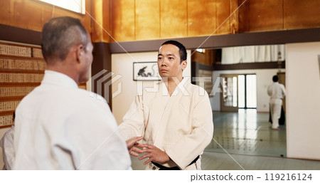 Aikido dojo, men and sensei for martial arts, learning or advice for combat at training, gym and class. Japanese people, moving hands or sport for fight, workout or fitness with zen, conflict or club Aikido dojo, men and sensei for martial arts, learning or advice for combat at training, gym and class. Japanese people, moving hands or sport for fight, workout or fitness with zen, conflict or club 119216124