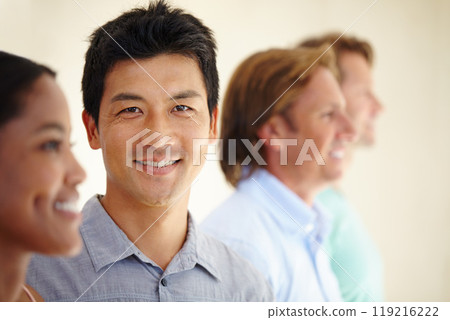 Asian man, diversity and coworker in row with smile for teamwork or collaboration and coworking as consultant. Portrait, colleagues and people as employees with confidence for business and growth Asian man, diversity and coworker in row with smile for teamwork or collaboration and coworking as consultant. Portrait, colleagues and people as employees with confidence for business and growth 119216222