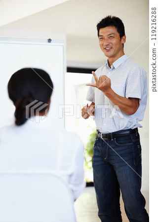 Asian man, presentation and workshop for meeting, planning and teaching for collaboration. Businessman, strategy and happiness with white board, seminar and teamwork for project in office workplace 119216288
