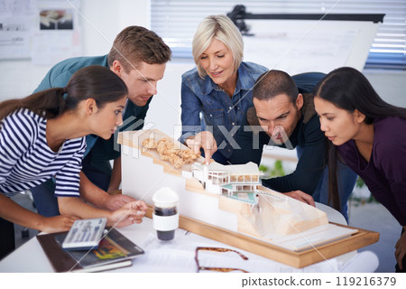 Architect, teamwork and diversity with design model, building and project with colleague people. Office, planning and working together in meeting for construction, pointing and concept for home build Architect, teamwork and diversity with design model, building and project with colleague people. Office, planning and working together in meeting for construction, pointing and concept for home build 119216379