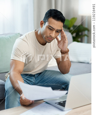 Man, bills and headache on computer and sofa for finance mistake, debt review or taxes stress at home. Young and confused person with documents for budget fail, bankruptcy or inflation news on laptop Man, bills and headache on computer and sofa for finance mistake, debt review or taxes stress at home. Young and confused person with documents for budget fail, bankruptcy or inflation news on laptop 119216491