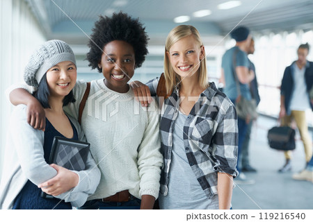 Students, women and portrait or happy at college with embrace for education, learning or knowledge. University, girl and friends with smile for break, relax and diversity with scholarship in corridor Students, women and portrait or happy at college with embrace for education, learning or knowledge. University, girl and friends with smile for break, relax and diversity with scholarship in corridor 119216540