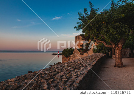 Krk Croatia 28.06.24 The walls of the Frankopan fortress at sunrise 119216751