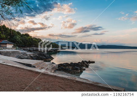 Krk Croatia 27..06.24Early morning on the beach in a quiet old town 119216754