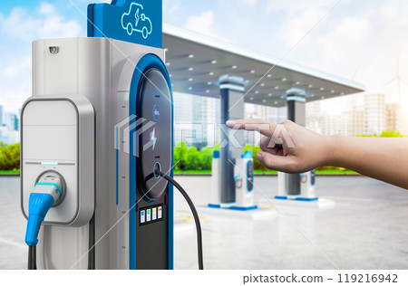 Ev charging station or electric vehicle recharging station with user hand finger point 119216942