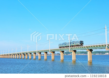 Ibaraki Prefecture Train running on the Kitaura Bridge in the blue sky 119218818