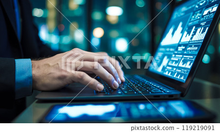 Professional IT businessman analyzing financial statistics on laptop, modern technology in business, corporate data management, digital marketing strategy development 119219091