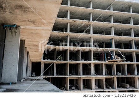 A new modern multi-storey residential building under construction A new modern multi-storey residential building under construction 119219420