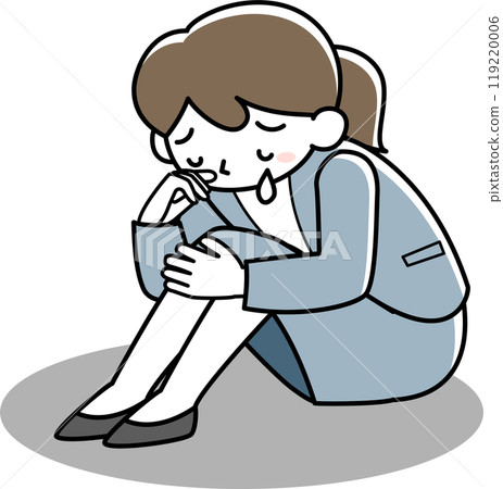 Woman holding her knees and crying 119220006