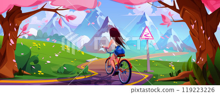 Young woman riding bicycle in mountain park 119223226