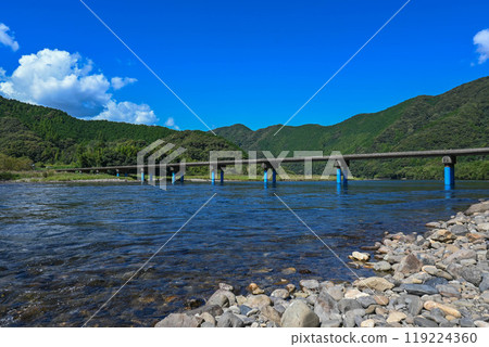 Sada Submerged Bridge surrounded by greenery Sada Submerged Bridge surrounded by greenery 119224360