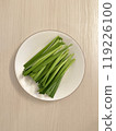 Chinese chives cut and placed on a plate 119226100