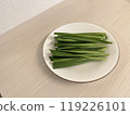 Chinese chives cut and placed on a plate 119226101