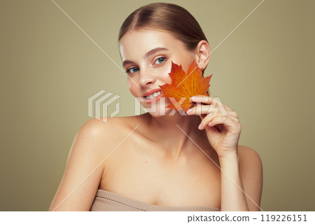 Autumn portrait of beautiful woman with clean fresh skin Autumn portrait of beautiful woman with clean fresh skin 119226151