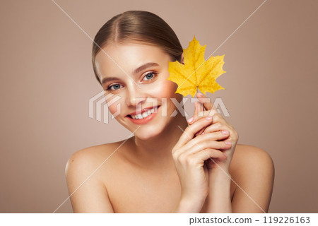 Autumn portrait of beautiful woman with clean fresh skin 119226163