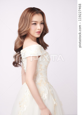 Beautiful young asian woman in wedding dress on white background, Beautiful young asian woman in wedding dress on white background, 119227468