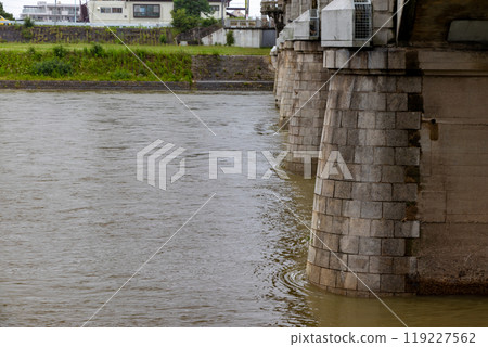Rising waters of a river 119227562