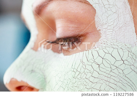 Girl with mud mask on face 119227586