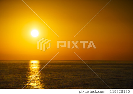 Sunset over sea 119228150