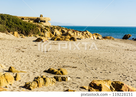 War bunker on the beach coast, Spain 119228151