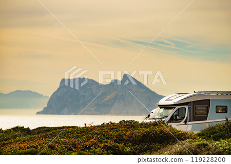 Caravan on spanish coast, Gibraltar rock on horizon 119228200