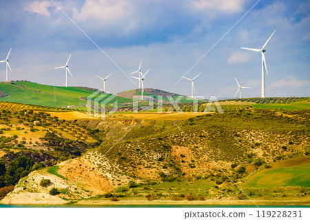 Hilly landscape with wind turbines, Spain 119228231