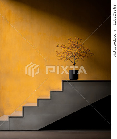 A minimalist staircase with a potted plant against a vibrant yellow wall in an indoor space 119228268