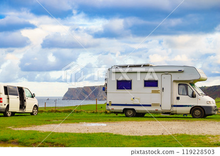 Camper on sea coast in Asturias Spain. Camper on sea coast in Asturias Spain. 119228503