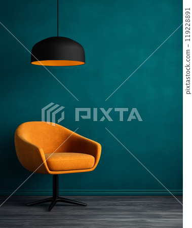 A stylish orange chair under a black pendant light against a teal wall in a modern interior 119228891