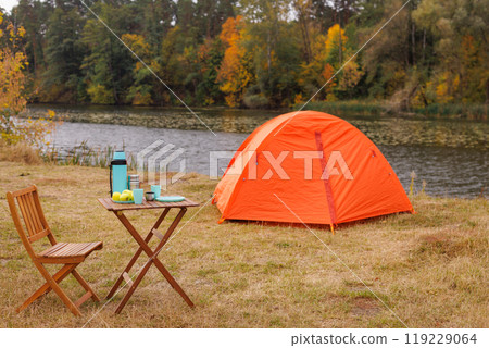 Cozy Camping Scene by the River Cozy Camping Scene by the River 119229064