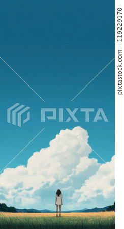 A solitary figure gazes at a vast blue sky filled with fluffy clouds above a tranquil landscape 119229170