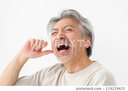Beauty Senior man laughing out loud Beauty Senior man laughing out loud 119229425
