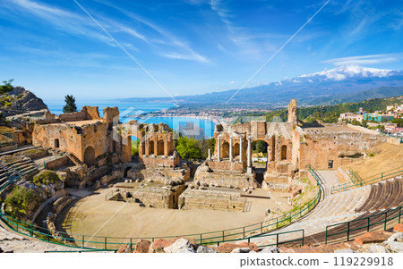 Ancient Greek theatre in Taormina on background of Etna Volcano, Italy 119229918