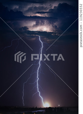 Huge lightning in dark stormy sky 119230332