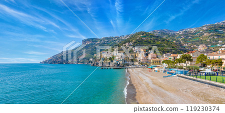 Blue sea and beach in Minori, Amalfi Coast, Campania region of Italy. Blue sea and beach in Minori, Amalfi Coast, Campania region of Italy. 119230374